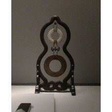 Double jade bi discs in a sandalwood gourd-shaped stand